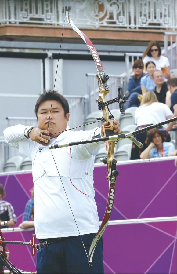 29일 런던올림픽 양궁장인 런던 로즈 크리켓 그라운드에서 열린 남자 단체전 3,4위전 한국-멕시코 경기에서 오진혁이 화살을 쏘고 있다.
